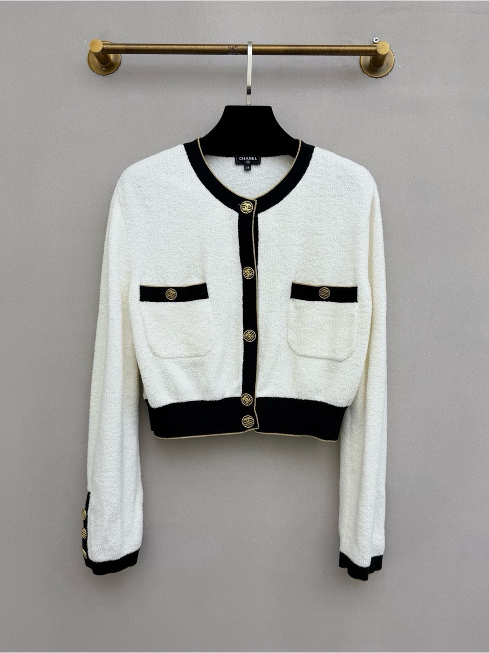 CHANEL Cream and Black Bouclé Cropped Jacket with Gold Buttons